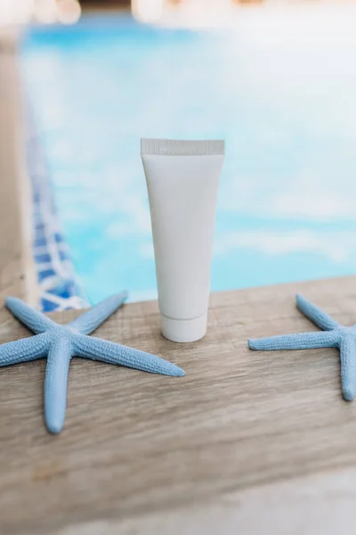 mockup of a tube for cream, packaging on a white background, sunscreen mocap, cream on a marine theme