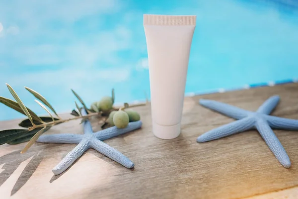 mockup of a tube for cream, packaging on a white background, sunscreen mocap, cream on a marine theme