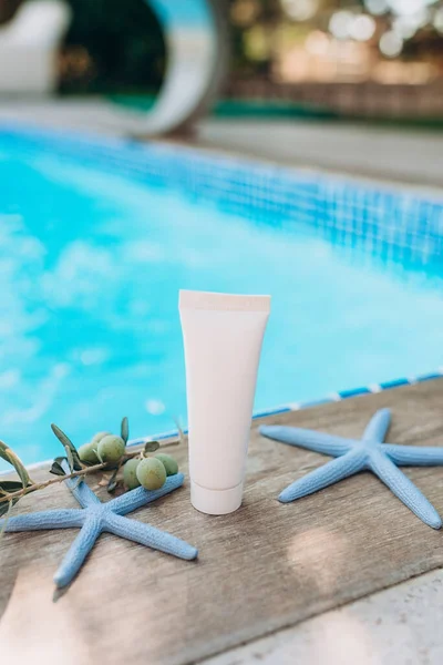 mockup of a tube for cream, packaging on a white background, sunscreen mocap, cream on a marine theme