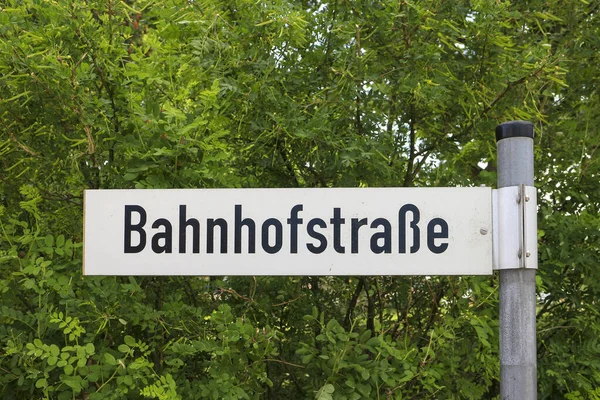 German Street Sign Translates Railroad Station Street English — Stockfoto