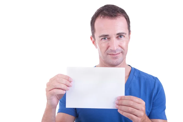 Portrait of a handsome man, with blank card in hand, smiling — Stock Photo, Image