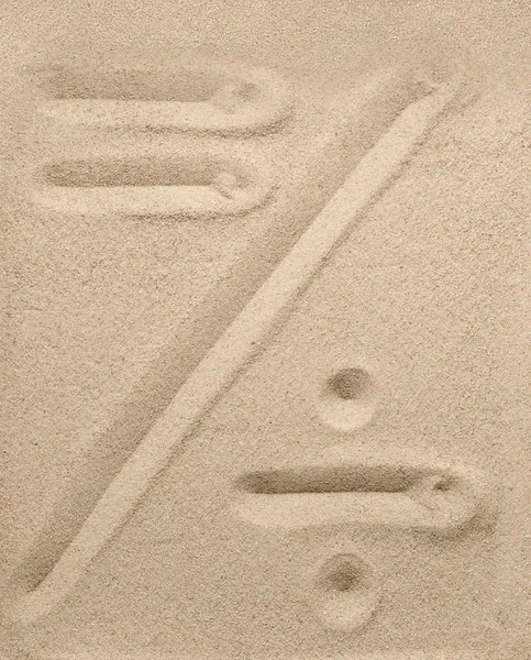 Division and an equal sign from sand — Stock Photo, Image