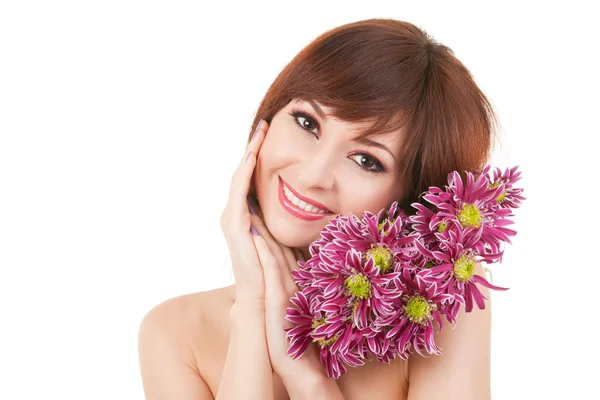 Roztomilá mladá žena s květinami — Stock fotografie