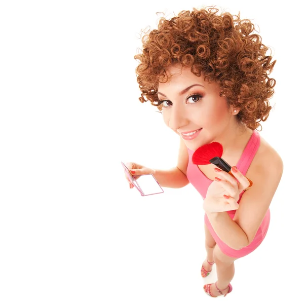 Fun woman with brush for makeup on the white background — Stock Photo, Image