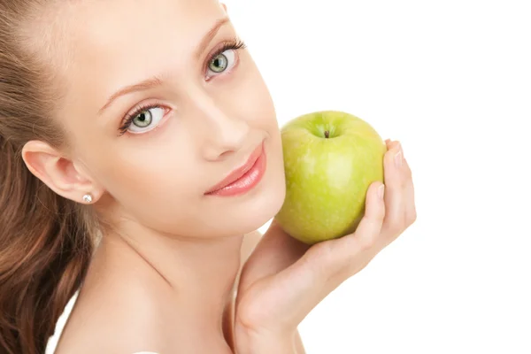 Portrait of a young woman with green apple — Stock Photo, Image