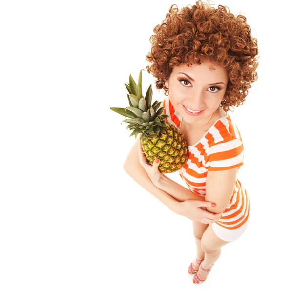 Fun woman with pineapple on the white background — Zdjęcie stockowe