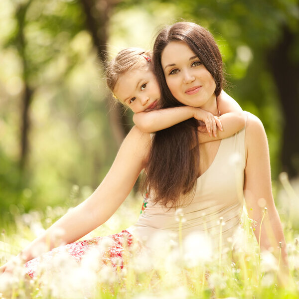 Mother and daughter in the park