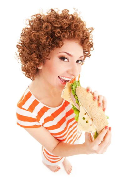 Donna divertente con panino sullo sfondo bianco — Foto Stock