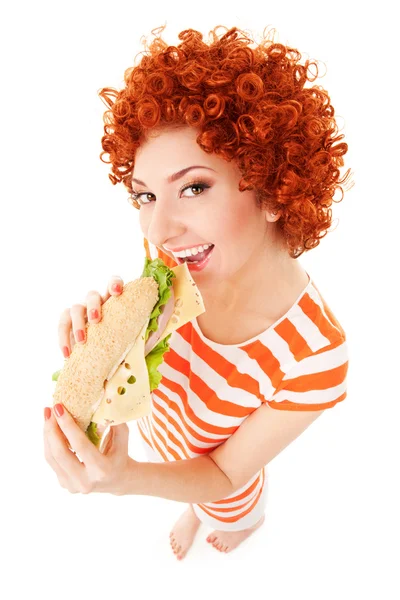 Donna divertente con panino sullo sfondo bianco — Foto Stock