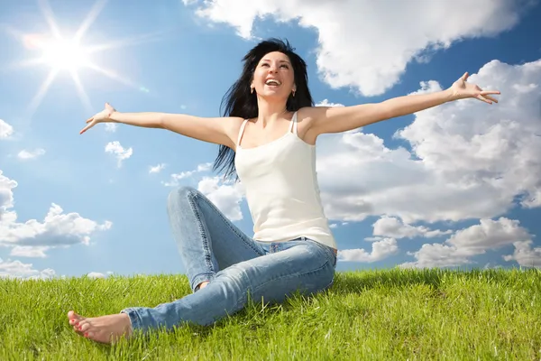 Happy young woman dreams to fly on winds — Stock Photo, Image