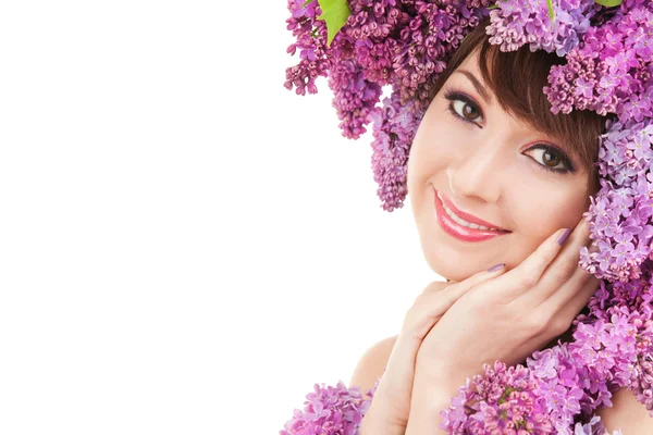 Mujer joven con flores sobre fondo blanco —  Fotos de Stock