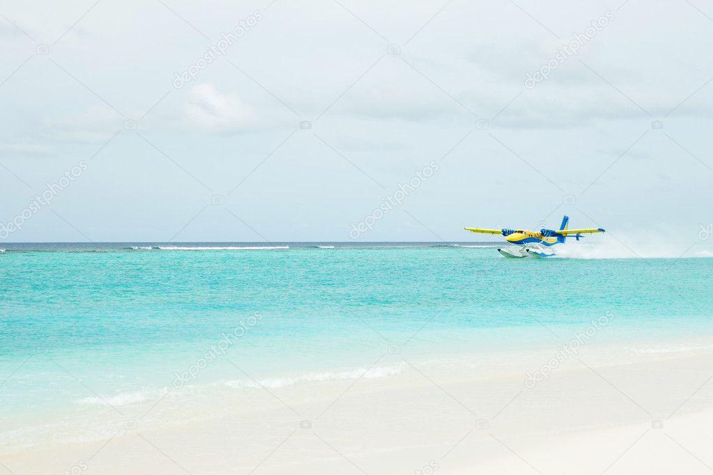 Sea plane from the beach background