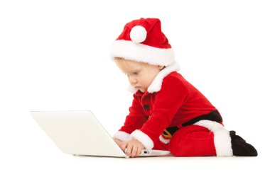 sevimli Noel baba bebek beyaz zemin üzerine laptop ile