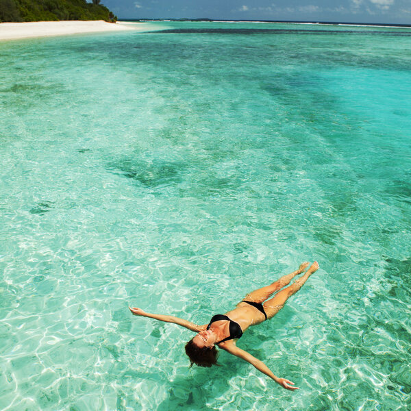 Woman relaxing in the sea