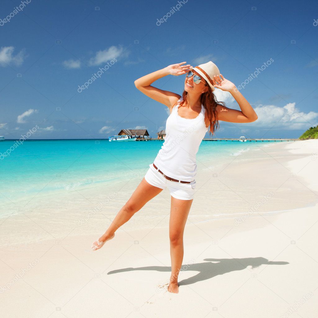 Happy woman on the beach