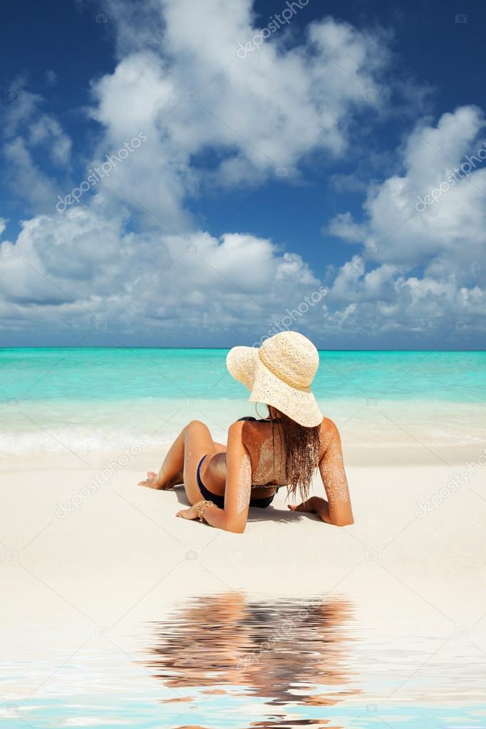 Young fashion woman relax on the beach