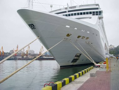 Ukraine, Odessa, Sea Commercial Port, November 25, 2012. The Ocean Cruise Liner MSC LIRICA Is Pinned by Stretched Mooring Ropes to The Fifteenth Berth of the Maritime Station 