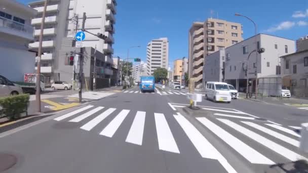 Punkt jazdy miejski krajobraz na ulicy miasta w Tokio w lecie szerokie ujęcie — Wideo stockowe