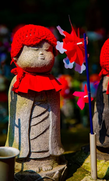 Statue Guardian Wearing Red Hat Daytime Minato District Tokyo Japan Royalty Free Stock Images