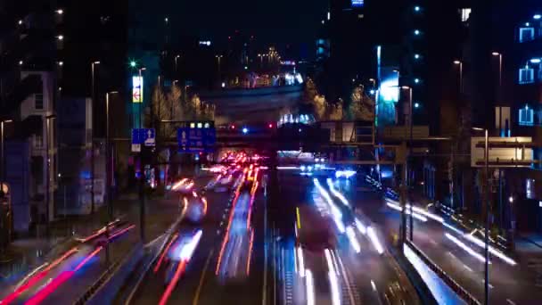 Une nuit timelapse de l'embouteillage dans la rue de la ville à Tokyo long shot — Video