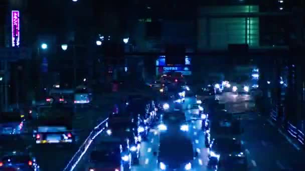 A timelapse noite do engarrafamento na rua da cidade em Tóquio tiro longo panning — Vídeo de Stock