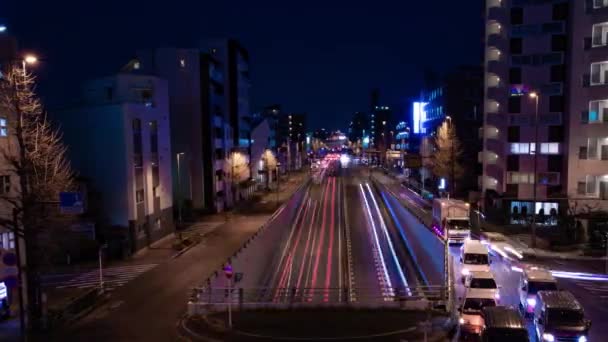 Μια νύχτα timelapse του μποτιλιαρίσματος στο δρόμο της πόλης στο Τόκιο ευρύ πλάνο panning — Αρχείο Βίντεο