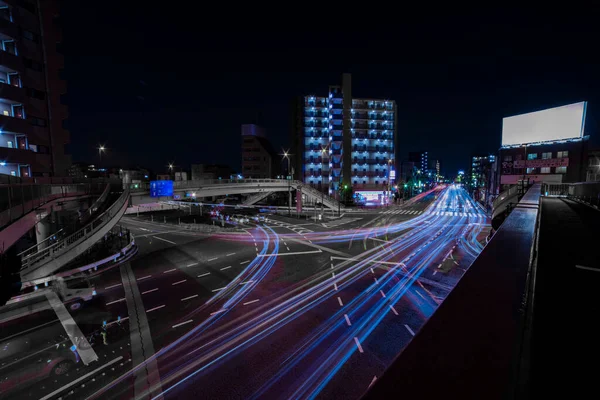 東京の交差点での夜のタイムラプス交通渋滞 — ストック写真
