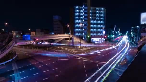 Ночной хронометраж пробки на перекрёстке в Токио — стоковое видео