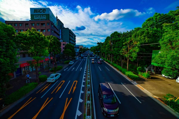 A downtown street at Kanpachi avenue in Tokyo daytime — Stock Photo, Image