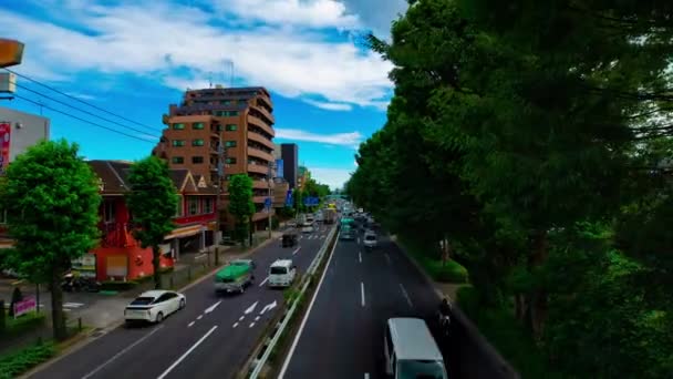 A timelapse of car street at Kanpachi avenue in Tokyo daytime wide shot zoom — Stock Video