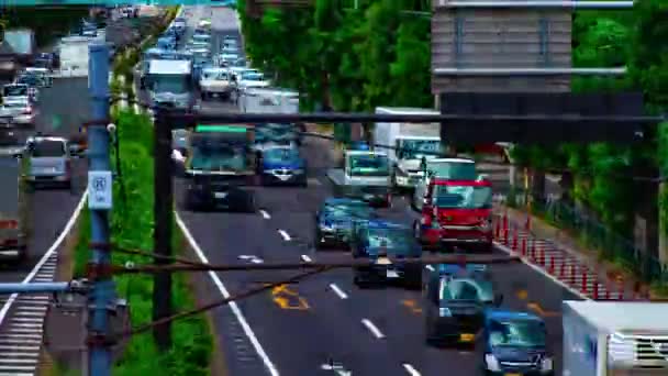 Časový průběh automobilové ulice na Kanpachi avenue v Tokiu denní náklon — Stock video