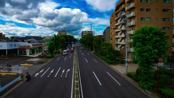 A timelapse of car street at Kanpachi avenue in Tokyo daytime wide shot panning — Stock Video
