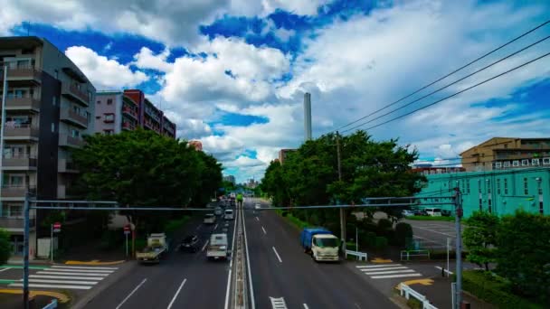 Um timelapse de rua de carro na avenida Kanpachi em Tóquio durante o dia tiro largo panning — Vídeo de Stock