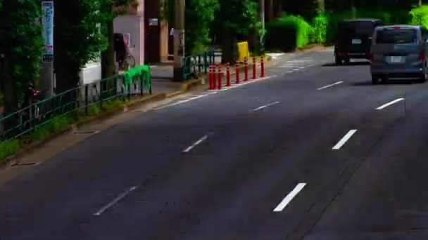A timelapse of car street at Kanpachi avenue in Tokyo daytime long shot zoom — Stock Video