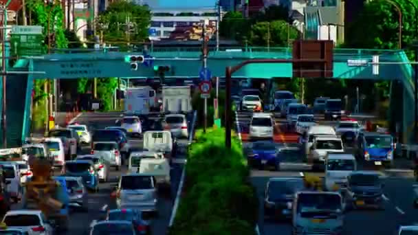 Uma timelapse da rua do carro na avenida Kanpachi em Tóquio zoom de tiro longo diurno — Vídeo de Stock