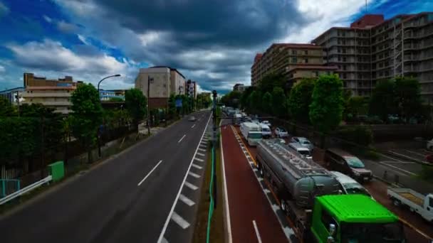 A timelapse of car street at Kanpachi avenue in Tokyo daytime wide shot tilt — Stock Video