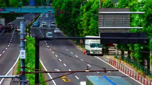 Un timelapse de la calle del coche en la avenida Kanpachi en Tokio tiro largo diurno — Vídeo de stock