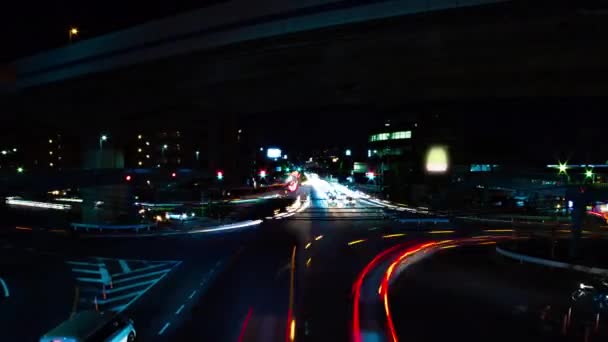 Sebuah malam tiLapse dari jalan kota di pusat kota di Setagaya Tokyo tembakan lebar zoom — Stok Video
