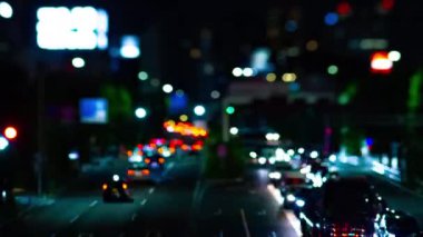 A night timelapse of the city street at the downtown in Setagaya Tokyo tilt-shit tilting