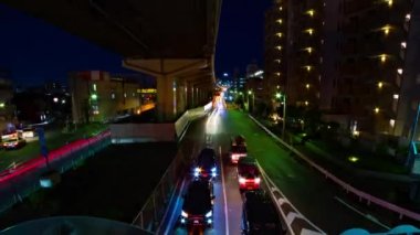 Setagaya Tokyo 'da şehir merkezindeki şehir caddesinin gece zoom' u