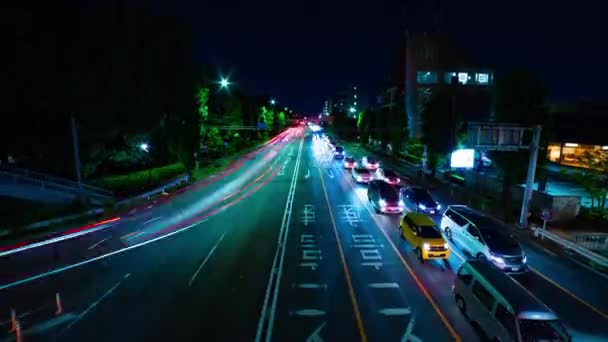 世田谷区のダウンタウンでの街歩きの夜のタイムラプス｜東京ワイドショット傾き — ストック動画