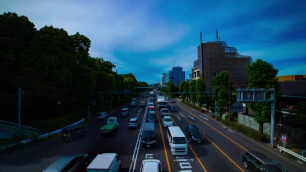 Uma timelapse da baixa da rua na avenida Kanpachi em Tóquio zoom de tiro largo diurno — Vídeo de Stock