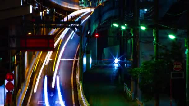 Sebuah malam tiLapse dari jalan kota di pusat kota di Setagaya Tokyo tembakan panjang miring — Stok Video