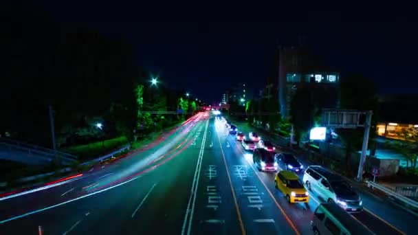 Nocny timelapse miejskiej ulicy na śródmieściu w Setagaya Tokio szeroki strzał tilt — Wideo stockowe