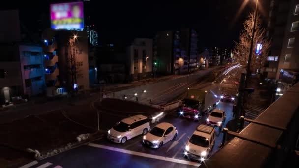 Een avond timeapse van de verkeersopstopping bij de stad straat in Tokio wijd shot zoom — Stockvideo