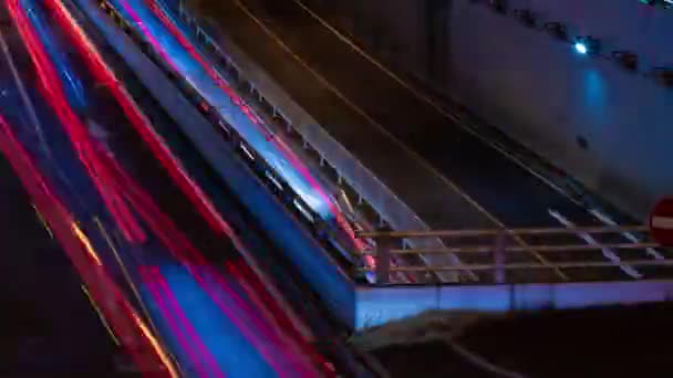 Une nuit timelapse de l'embouteillage à la rue de la ville à Tokyo longue vue panoramique — Video