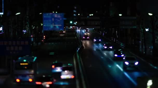 Az éjszakai időeltolódás a miniatűr forgalmi dugó a város utcájában Tokióban billent — Stock videók