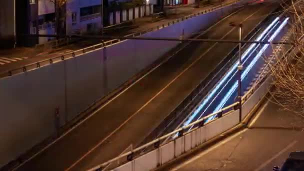 東京の街中での渋滞の夜の経過パンニング — ストック動画