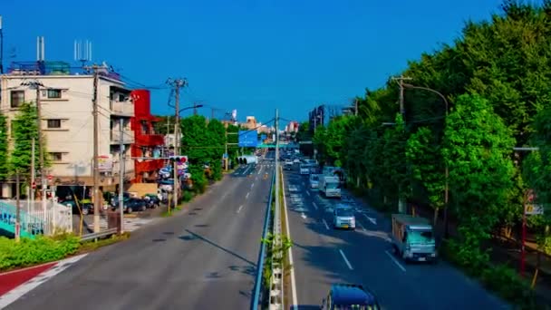 Uma timelapse da baixa da rua na avenida Kanpachi em Tóquio zoom de tiro largo diurno — Vídeo de Stock