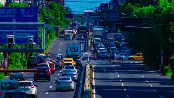 A timelapse of downtown street at Kanpachi avenue in Tokyo daytime long shot zoom — Stock Video